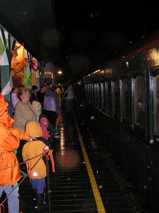 Photo of The Last Load of Passengers on the Rainy Friday Halloween Train
