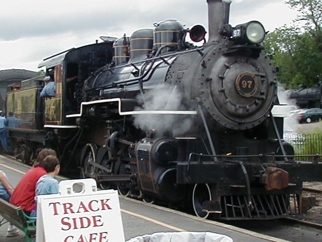 Photo of Valley Railroad #97 backs up to its coaches
