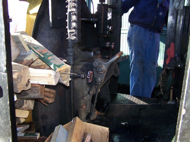 Photo of Inside the cab of number #4 being filled with wood.