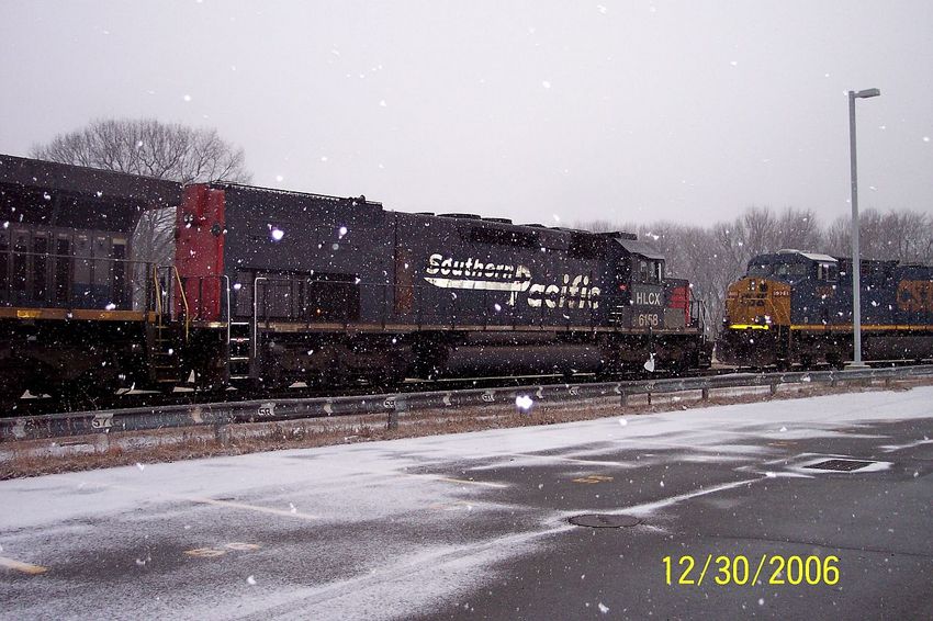Photo of Side shot of HLCX SD40-2T 6158 on the east leg of the Framingham wye.