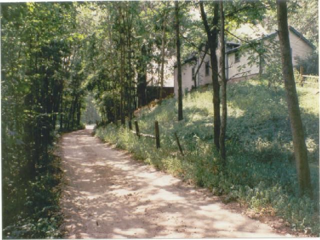 Photo of ROW facing downhill toward the start of Narrowgauge Way