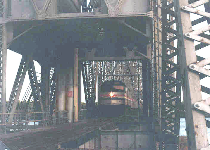 Photo of Amtrak EMD F40PH Engine #320 Coming Off the Cape Cod Canal Railroad Bridge