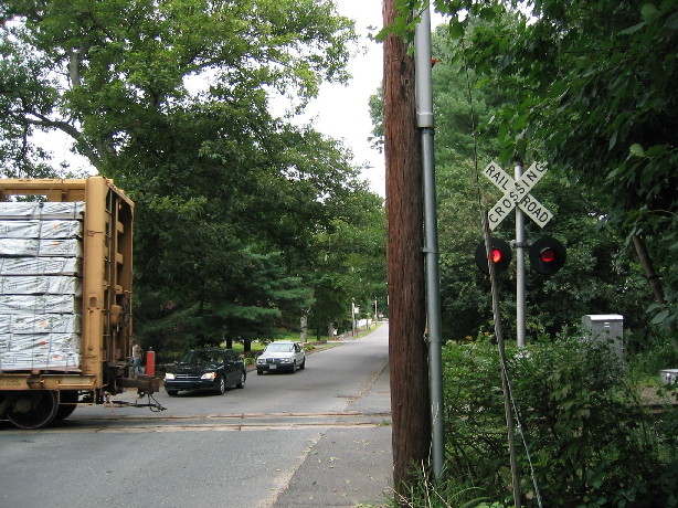 Photo of Freight Train Finishes Crossing Summer Street in Northborough, MA
