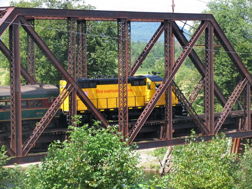 Photo of NHCR GP16 1732 crossing rhe Bridge in  Groveton.