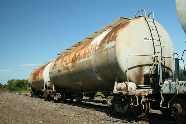 Photo of These Hopper Cars carry ash for FSI in Plymouth, Maine.
