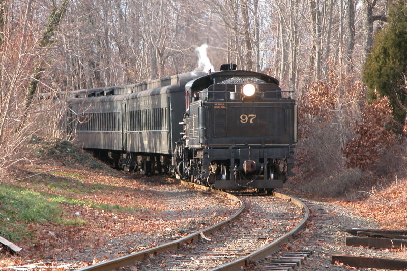 Photo of Valley Railroad #97 whistles the grade crossing in Essex, CT.