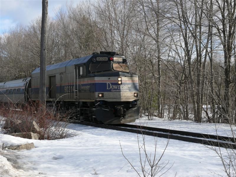 Photo of Amtrak 692 at track speed thru Arundel Maine