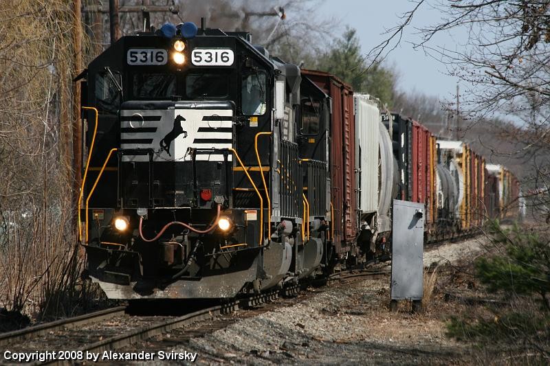 Photo of WASE led by GP38-2s NS5316 and NS5357 in Tewksbury