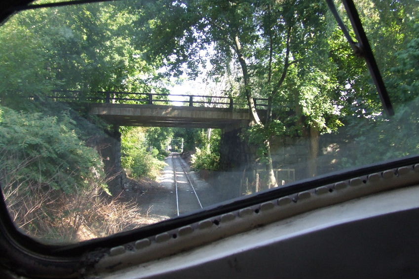 Photo of The train ran under many bridge at Bath.