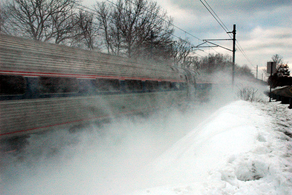 Photo of Dirty snow dusted with clean, Amtrak Regional thru Slocum,RI