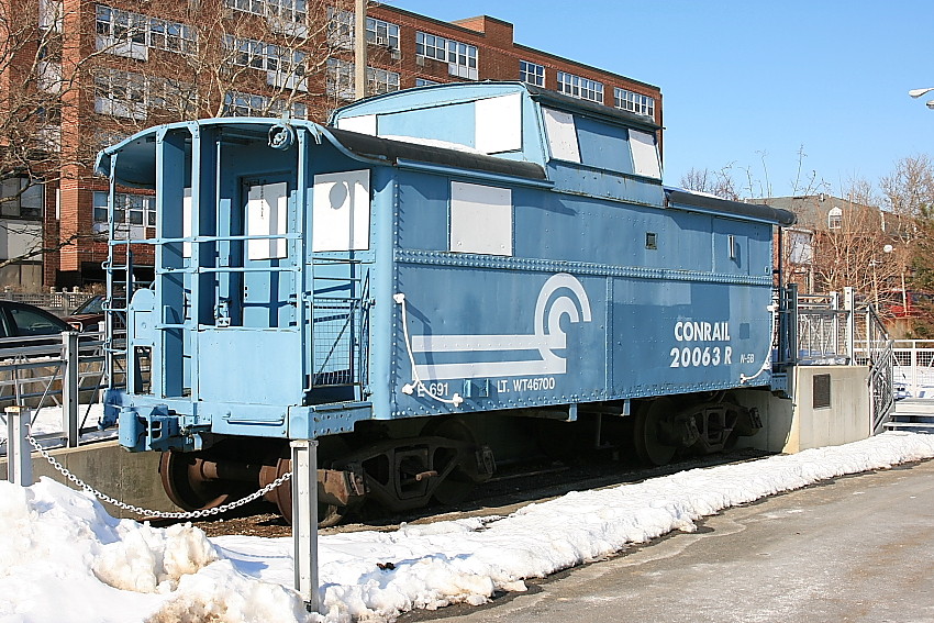 Photo of Former Conrail caboose near the end of the East Boston Branch