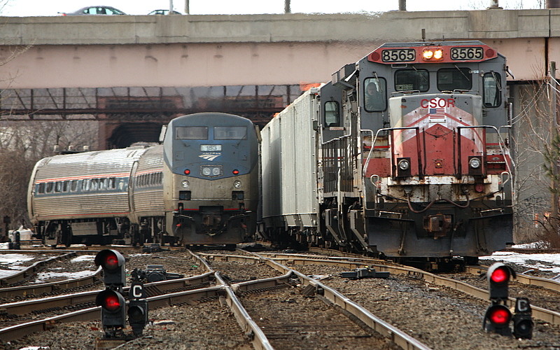 Photo of CSO-4 backs accross the CT River as Amtrak New Haven Shuttle departs