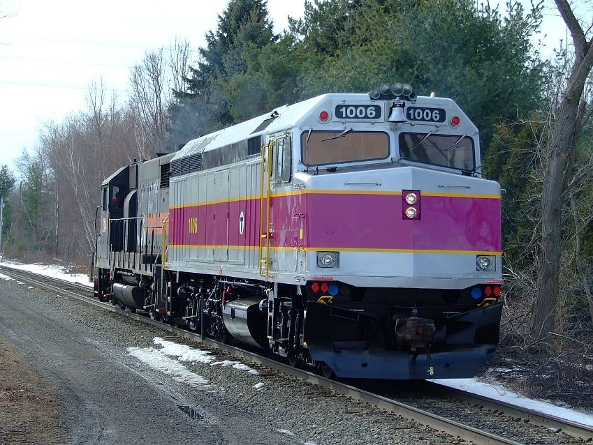 Photo of ST 214 hauls MBTA 1006