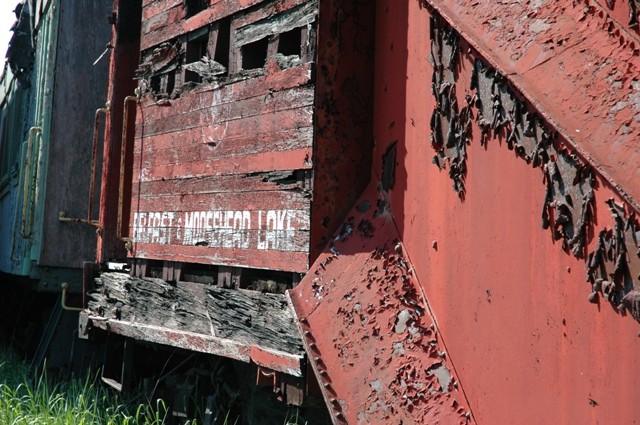 Photo of Older wooden snow plow stored  in the Thorndike Yard as of June 2005. Serious fi