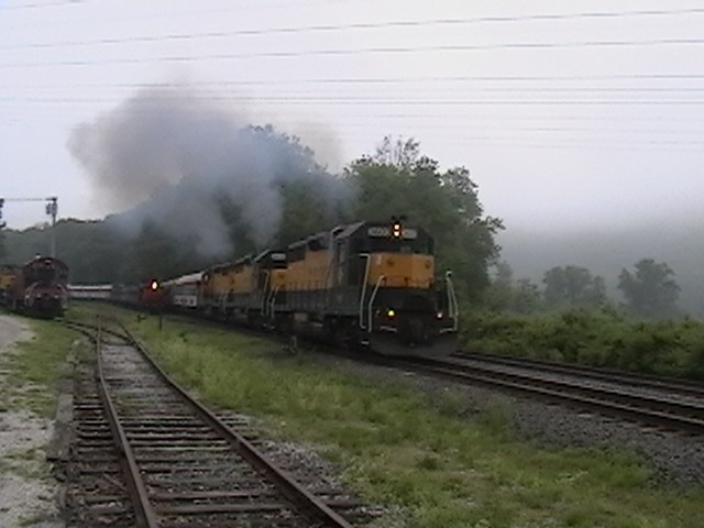 Photo of housatonic railroad jes train heading to danbury ct stacks are open wide