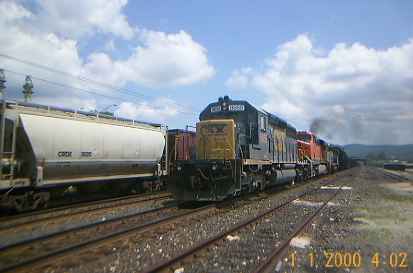 Photo of csxt q293 stoped at pittsfield yard office and a brand new bnsf es44ac