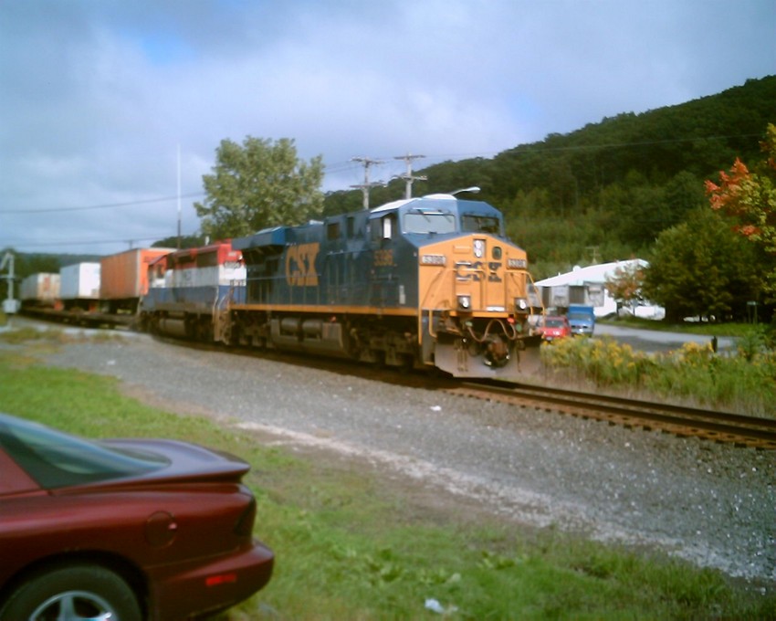 Photo of csxt train at canaan ny and a old bcrail sd40-2 now hlcx