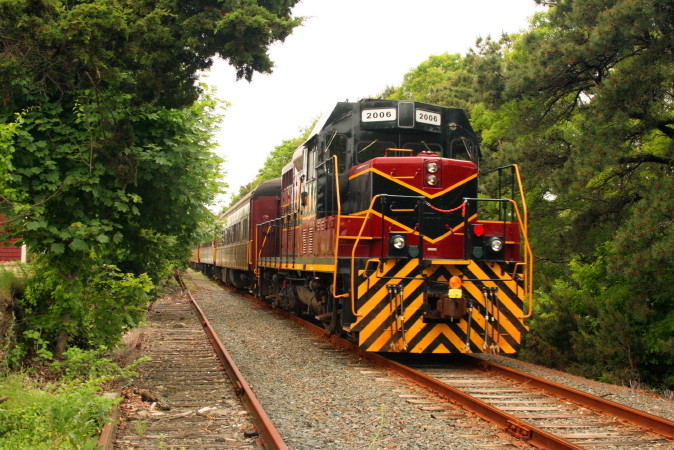 Photo of Mass Coastal Scenic train rolls into Hyannis, MA