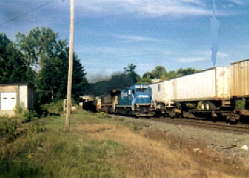 Photo of old conrail b23-7 on q116 passing q119 at oak st