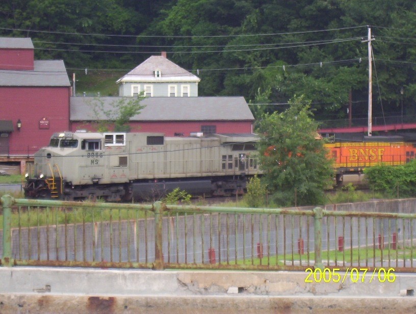 Photo of grey ghoast of conrail ns 9-44cw and bnsf 9-44cw