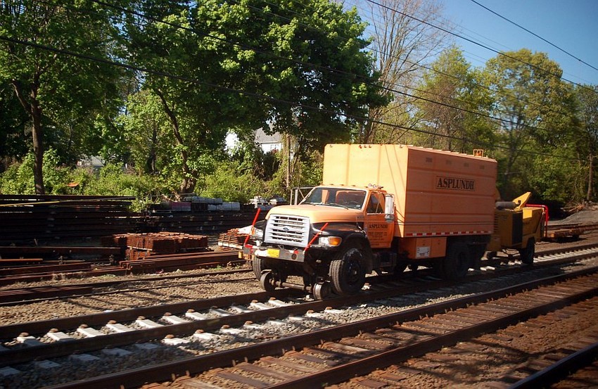Photo of Asplundh Hi-Rail MoW Truck and Trailer