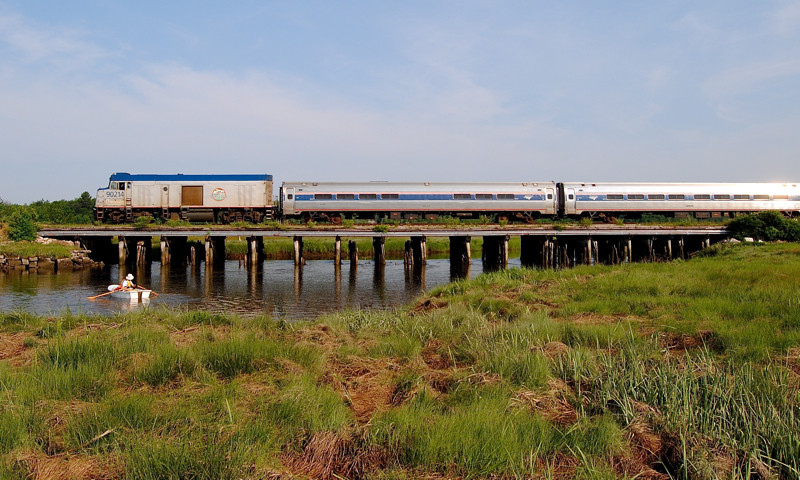 Photo of Downeaster 682 through the Scarborough Marsh