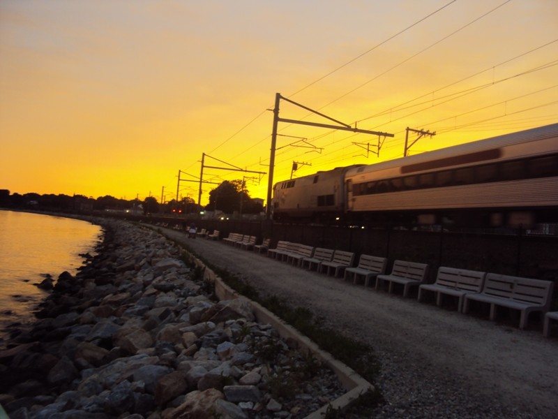 Photo of SLE riding west in the sunset