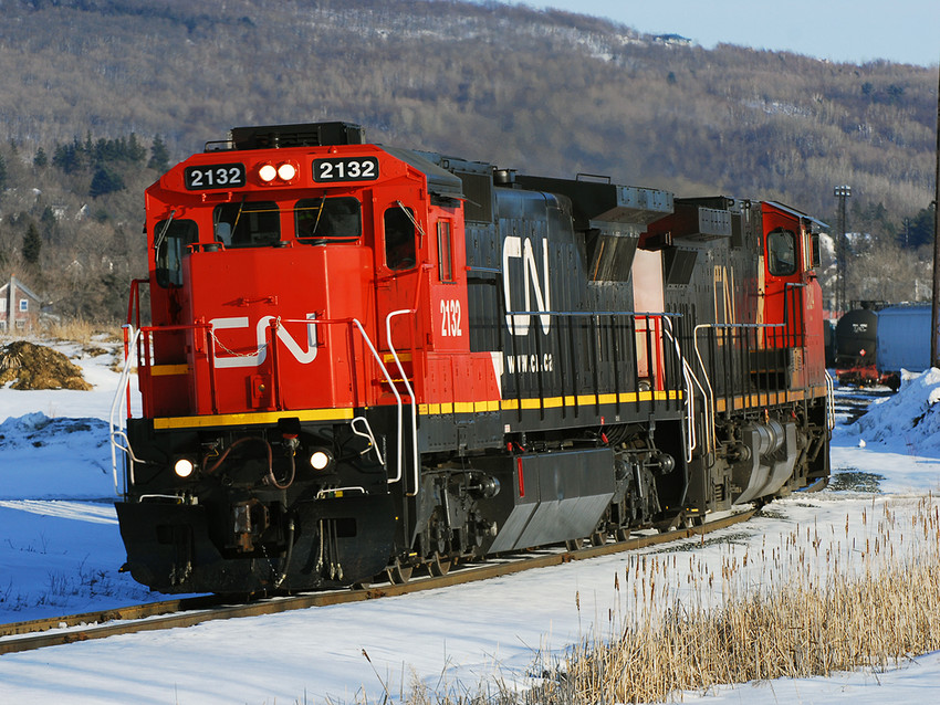 Photo of CN 323 Passes the NECR St. Albans Yard