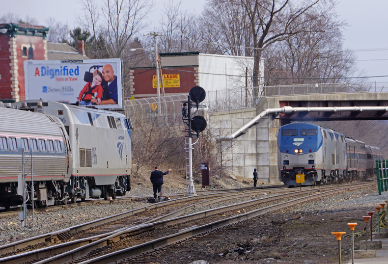 Photo of Train 449 passes Train 55 in Palmer
