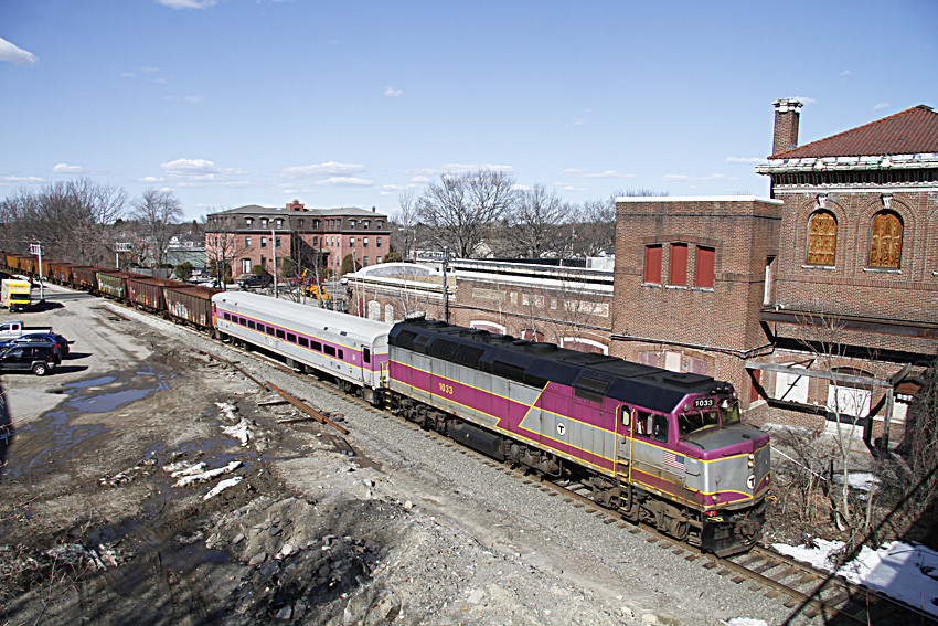 Photo of MBTA #1033 leads a equipment move past Clinton Station