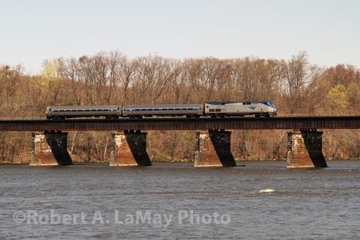 Photo of Amtrak Shuttle crosses River
