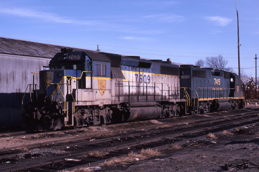 Photo of D&H 7609 & 7415 sit at Lawrence yard