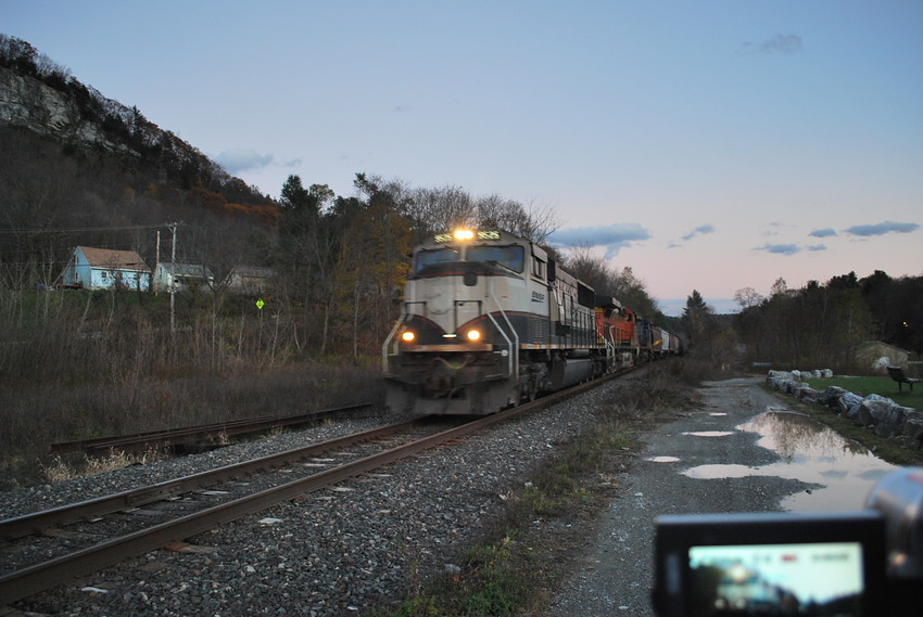 Photo of empty grain train @ north pownal vt with a great sunset