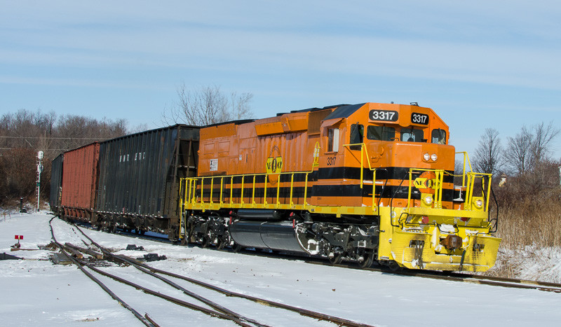 Photo of NECR 3317 leads wood chip train into Italy yard, St Albans, VT
