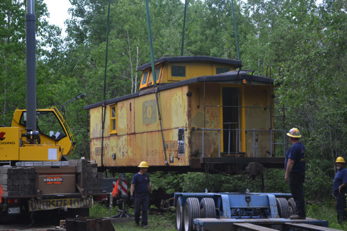 Photo of Maine Central Railroad Caboose 610 on the Move (1 of 4)