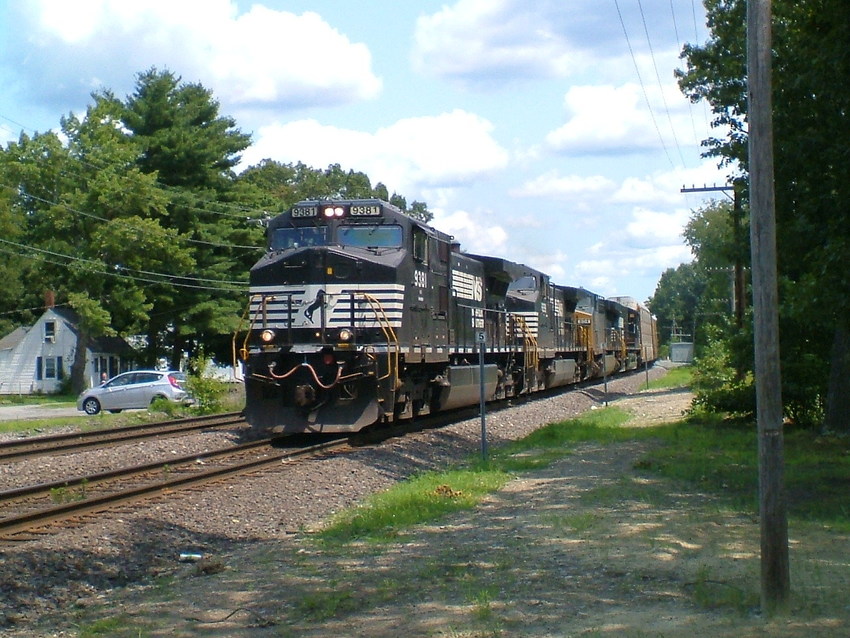 Photo of Westbound freight at Shirley Mass with NS & CSX engines.