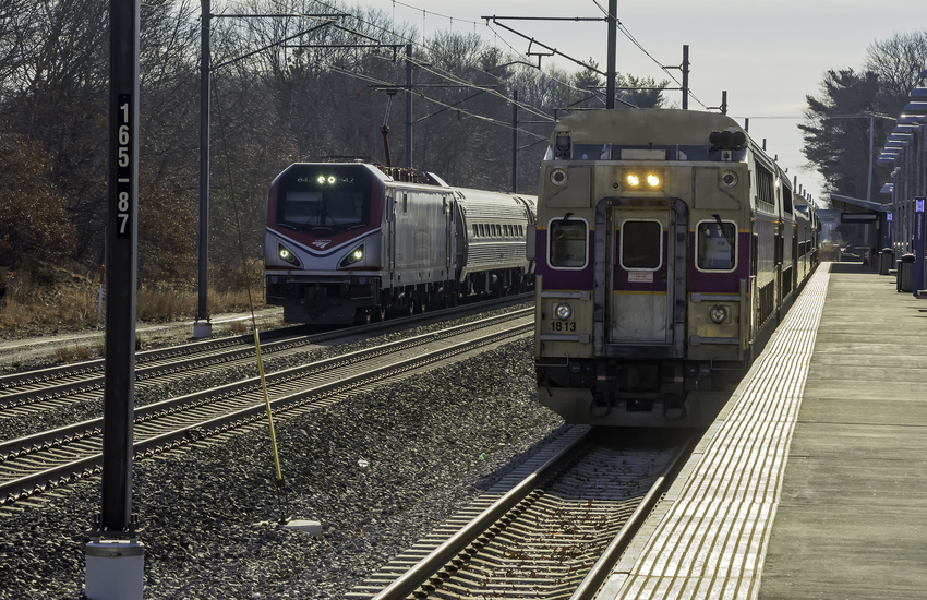 Photo of Amtrak Veterans Unit Passing MBTA at Wickford Jct