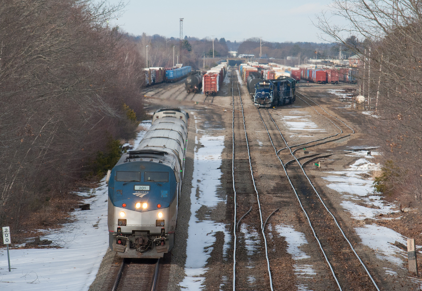 Photo of Amtrak 686 Passes POED 615 at Rigby Yard
