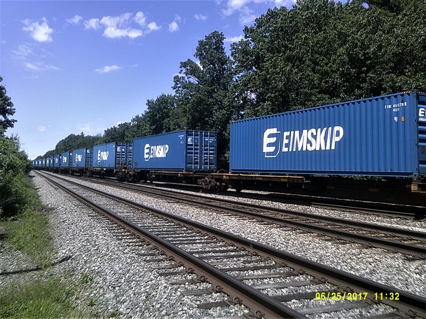 Photo of Empty Eimskip water cars crossing over at the Willows,Ayer,Mass.
