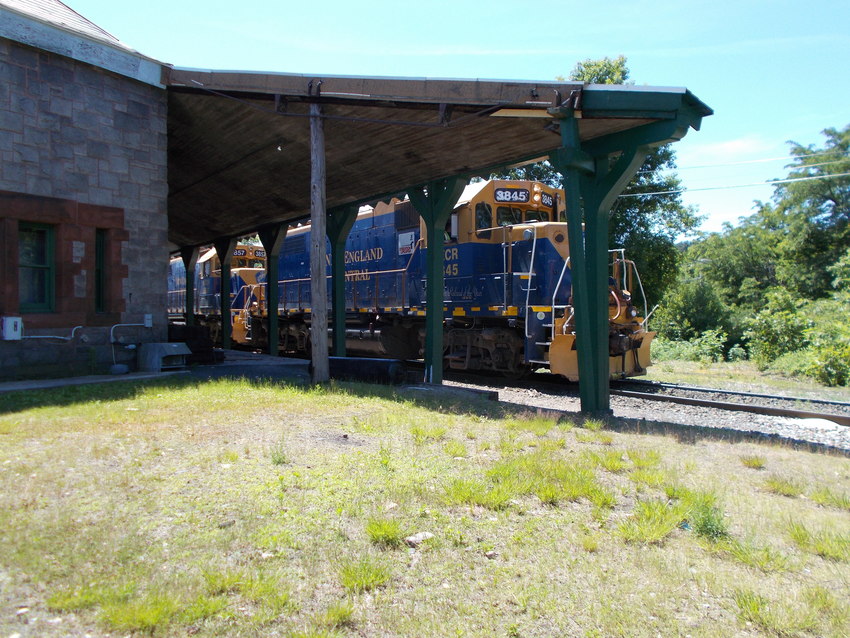 Photo of two Blue and Gold GP-38AC's in Palmer Mass