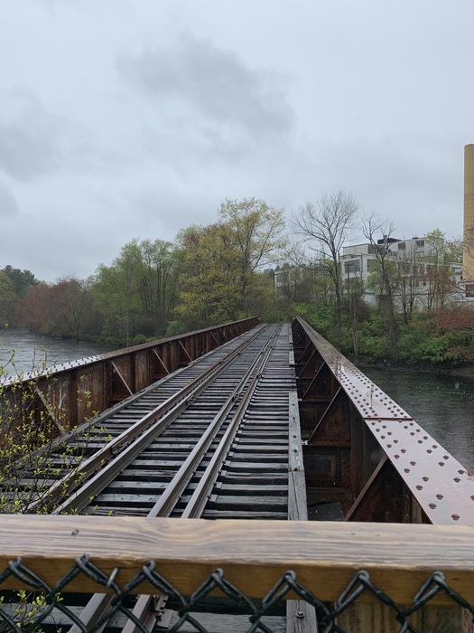 Photo of Abandoned rail bridge in orange ma