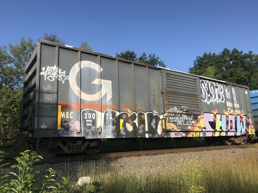 Photo of The outside appearance of a Guilford Rail boxcar