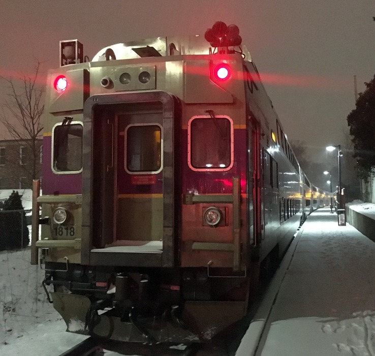 Photo of MBTA train in the evening snow