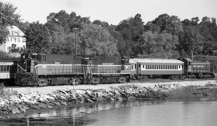 Photo of Maine Coast Light Power Passing Excursion Train at Wiscasset